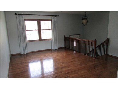Living Room- Updated Lighting, New wood flooring