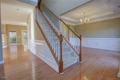 FOYER: Stunning two story foyer entrance accented 