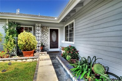 River Rock Exterior Accents and Custom Entry Door 