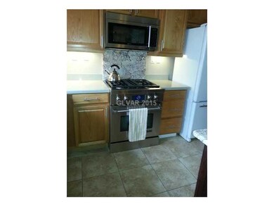 Property Photo. Jenn Air appliance, walk in pantry