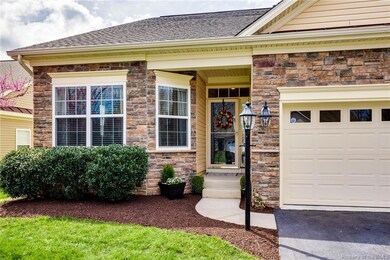 Craftsman style entry! Beautifully landscaped!