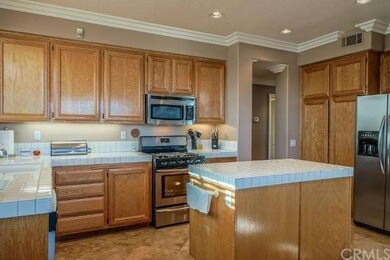 Kitchen with stainless steel appliances and center
