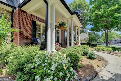 The front yard is a flower lovers oasis!