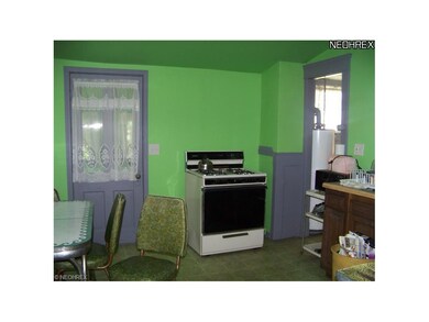 Kitchen - to the right is hot water tank and extra