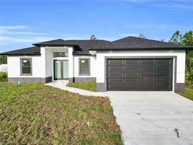 746 Colyer St E, Lehigh Acres, FL 33974 - photo 2