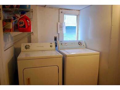 Laundry Room. Shared laundry room has side by side units.