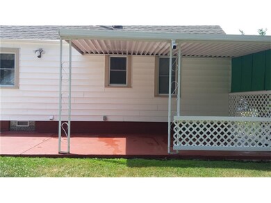 Large covered patio with GFI outlet.  Patio size i