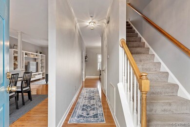 Hardwood floors and fresh paint in this center hal