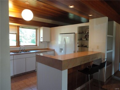 Bright kitchen with breakfast bar & indirect light