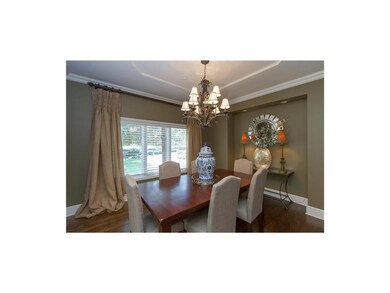 Gorgeous dining room with lighted alcove!