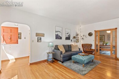 Living room with view of the front entry with dutc
