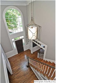 Dramatic two-story foyer with plenty of natural li