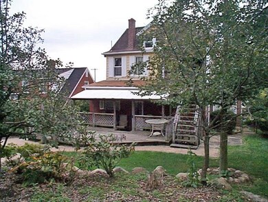 Landscaped back yard.  Has a covered back porch to