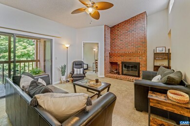 Living room opens out onto private covered balcony
