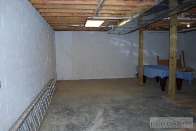 Full unfinished basement with sliding doors to dec