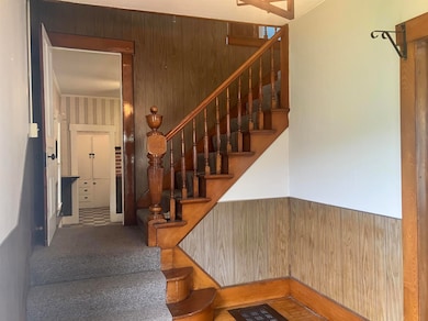 Unique Foyer with Pass Through Stairway