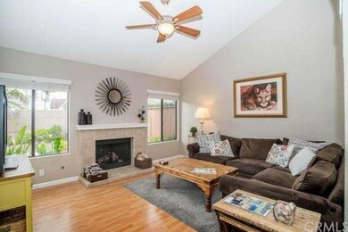 Spacious living room with vaulted ceiling and gas 