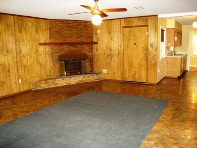 Enlarged Den with Fireplace Measures 23x19!