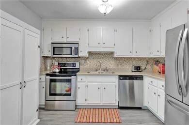 New Flooring complimenting the back splash.