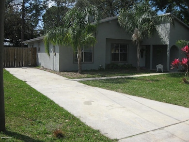 Long driveway continues after fence