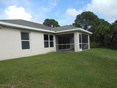 1222 Howell St E, Lehigh Acres, FL 33974 - photo 2