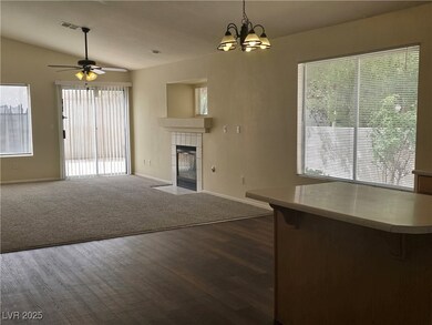 Unfurnished living room with a fireplace, lofted c