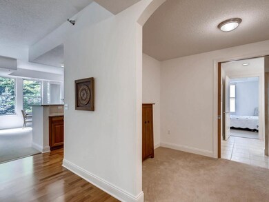 Airy Foyer - view into office and opening into kit
