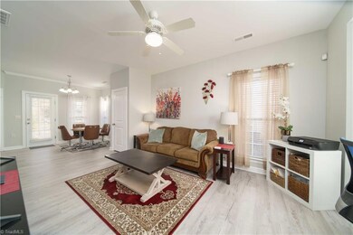 open living room, dining room and into kitchen