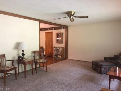 living room leads into the kitchen