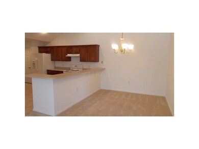 Dinning  area with breakfast bar.