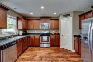 Stainless appliances, beautiful cabinets, & a separate pantry!