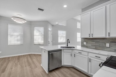 3290 Covered Bridge Dr W, Dunedin, FL 34698 - photo 7