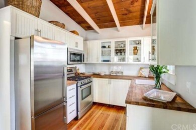 Fabulous remodeled kitchen with vaulted wood plank
