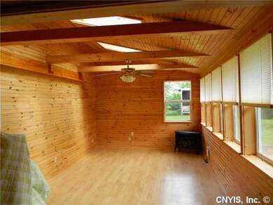 Morning room. T&G Knotty Pine with gas space heate