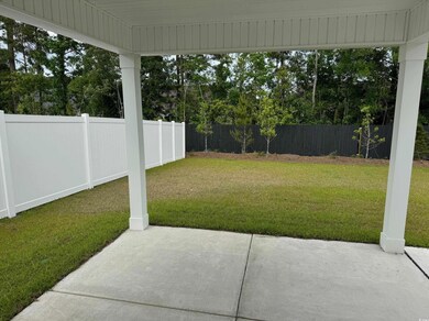 View of yard with a patio and a fenced backyard