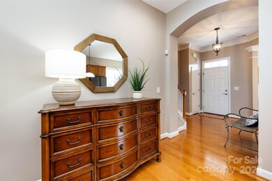 Welcomed in with gorgeous wood floors!