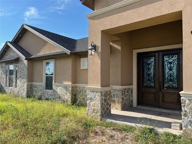 Entrance to property featuring french doors