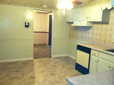 Kitchen. Eat in Kitchen with new floor. Lowes inst