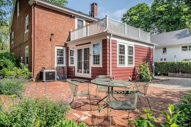 Walk out of the sunroom through the French doors to the patio for a summer meal with family or friends.