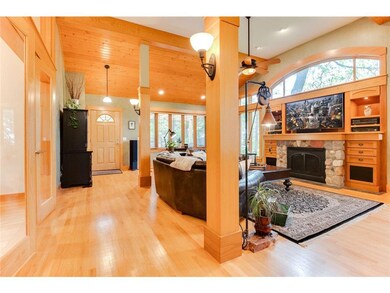 Great room addition has hardwood floors and a gas 