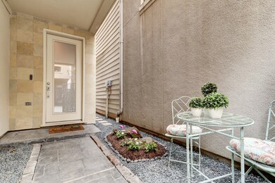 A gated courtyard greets you at the front of the h