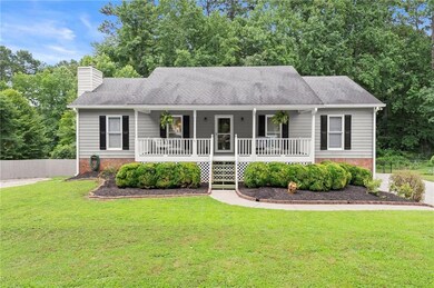 Ranch-style home with a porch, a chimney, and a shingled roof