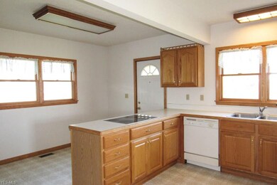 The kitchen opens to the dinette.