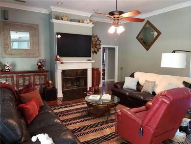 Family Room Offers Wood Burning Fireplace.  Recess
