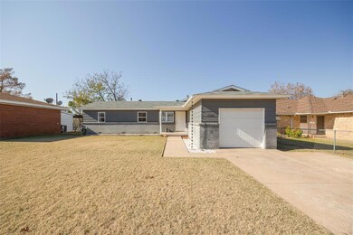 Single story home with a garage