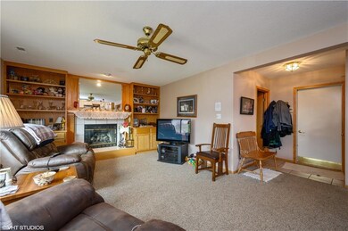 Family Room with Fireplace and natural light