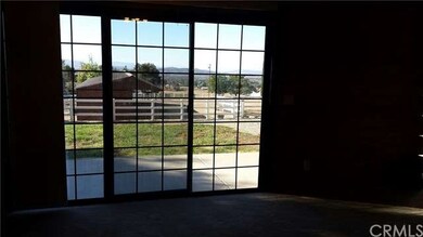 View out sliding glass door in living room