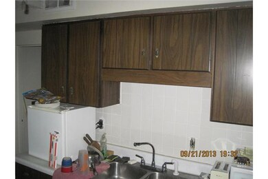 Kitchen. Patio door off kitchen to 3 season porch