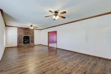 Living room with dining room entry