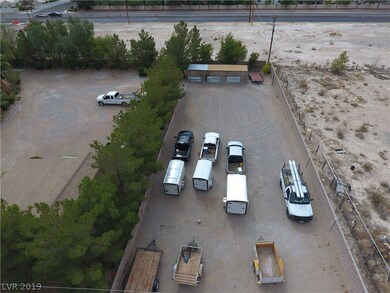 This picture shows the horse arena and 3 stalls wh